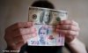 Попит валюти серед українців у червні знизився